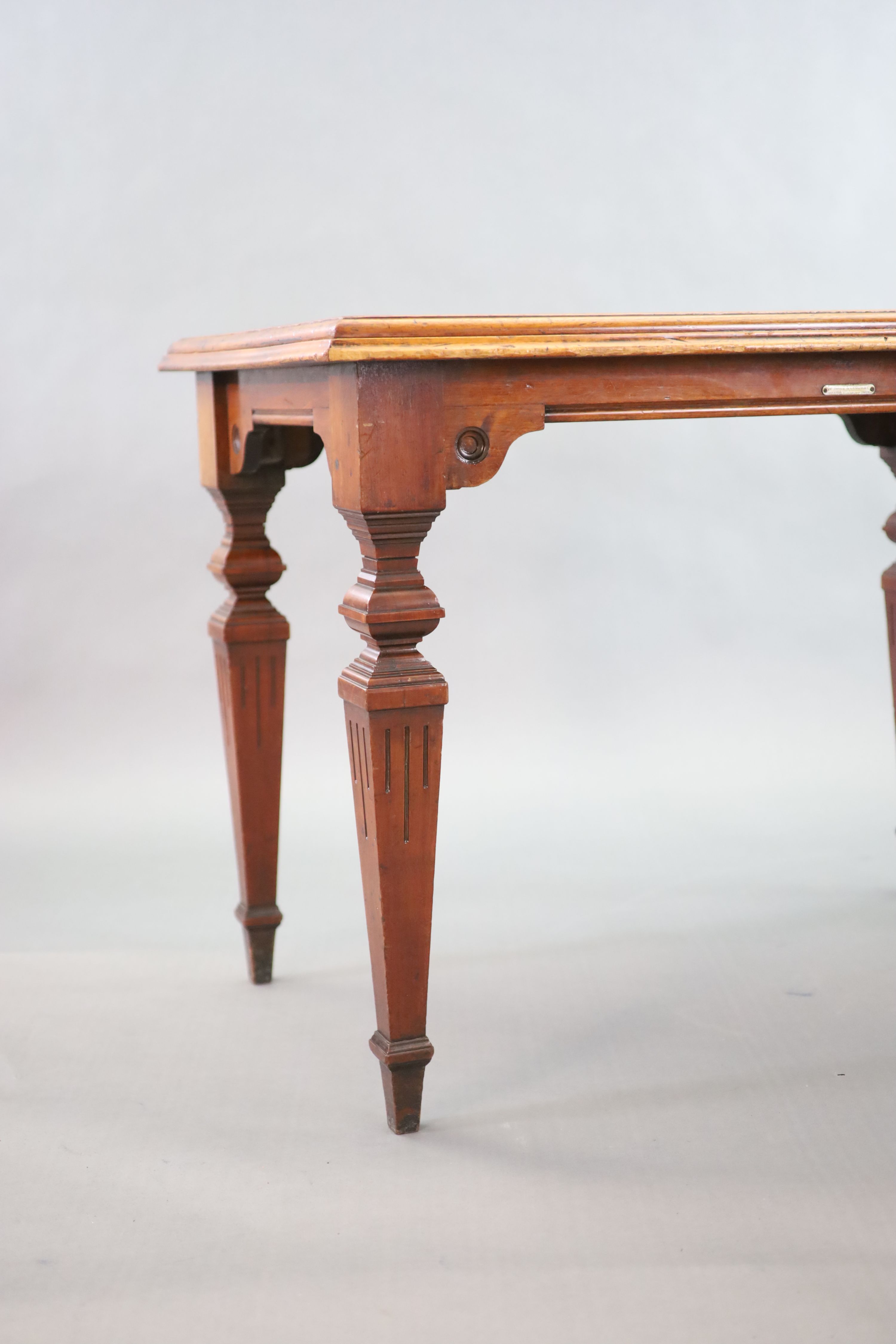 A Victorian mahogany library table, supplied by Sage & Co. Shopfitters of London, W.113cm D.69cm H.78cm